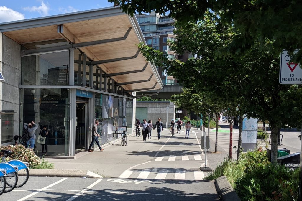 Public skytrain transportation that is close to residential buildings